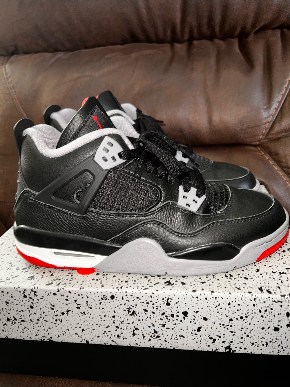 Air Jordan 4 Retro PREOWNED.